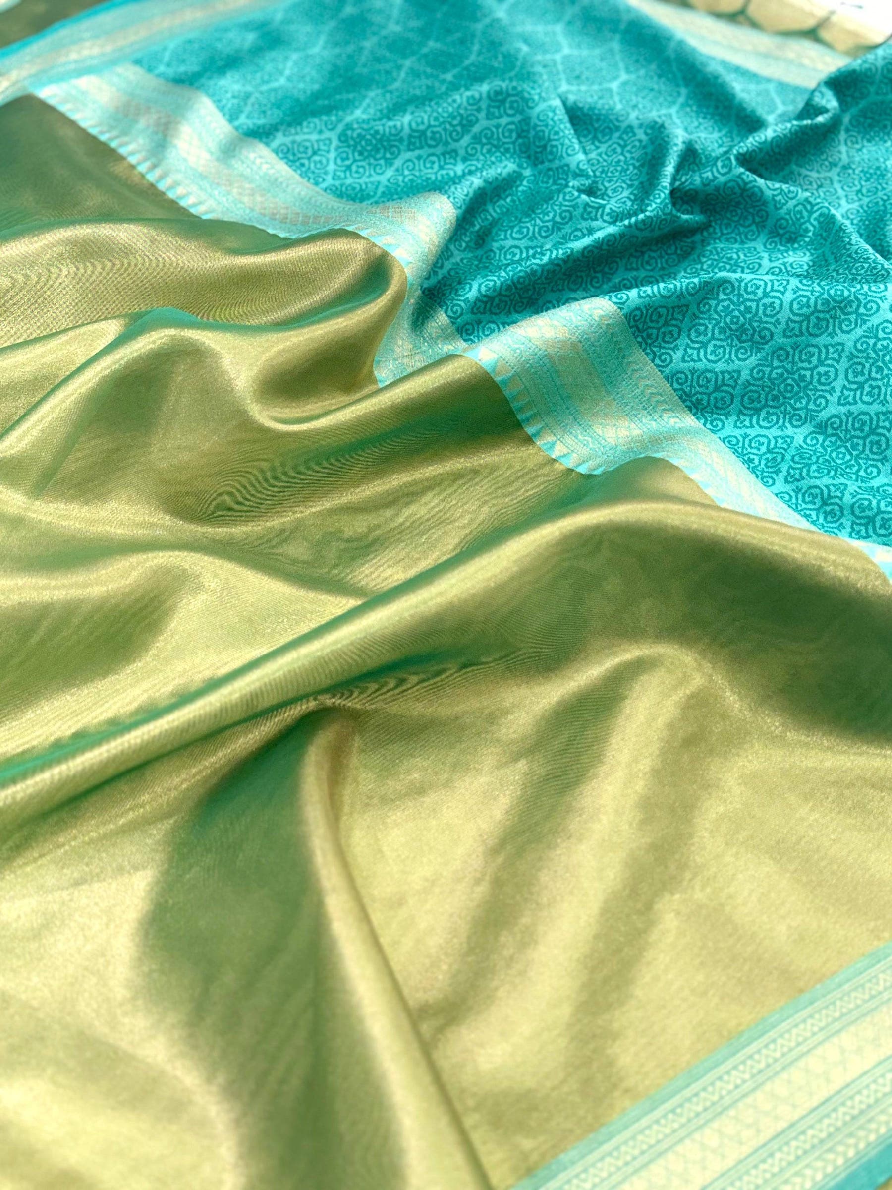 Elegant Sky Blue Gold Zari Tissue Saree