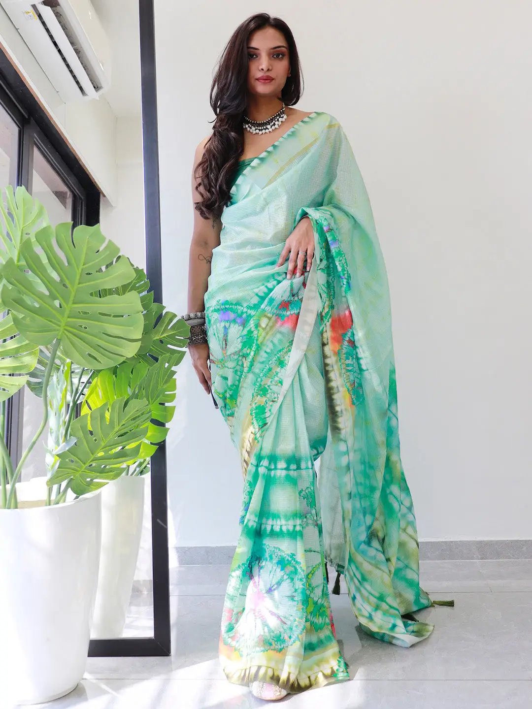 Designer sea green tie dye satin Kota Doriya saree with unique motifs