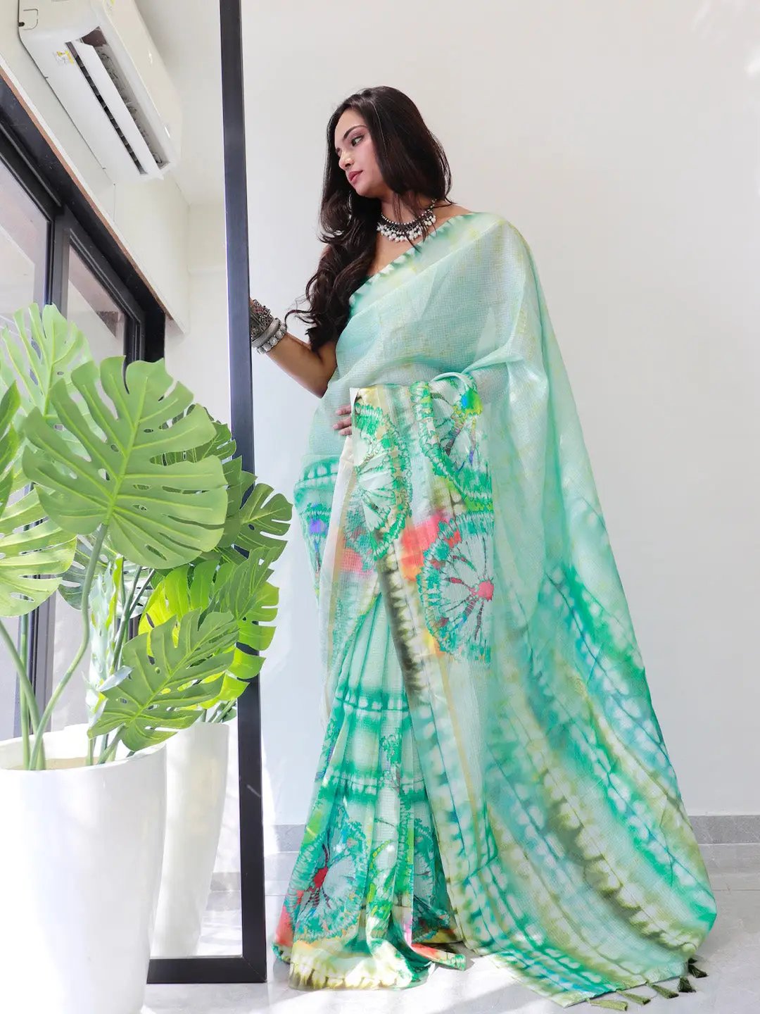 Chic sea green tie dye satin Kota Doriya saree with colorful accents