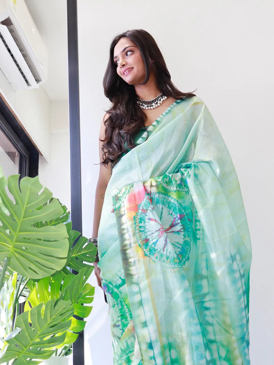 Sea green tie dye satin Kota Doriya saree with intricate design