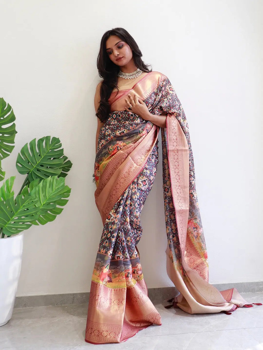 Model showcasing Moonga Silk Kota Doriya Patola saree design