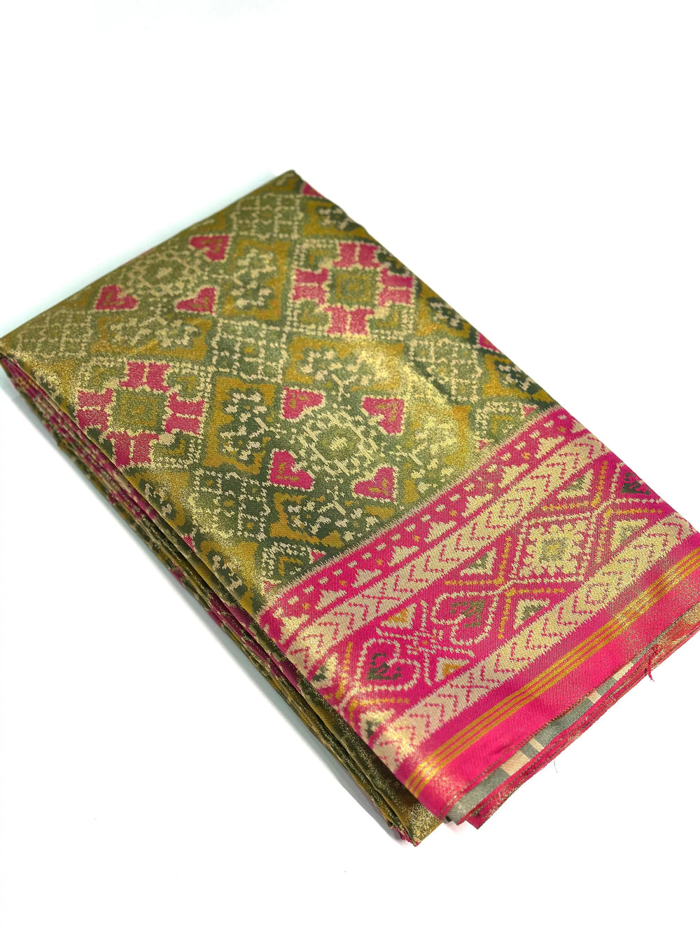 Mendi Green Double Ikkat Semi Silk Patola folded view