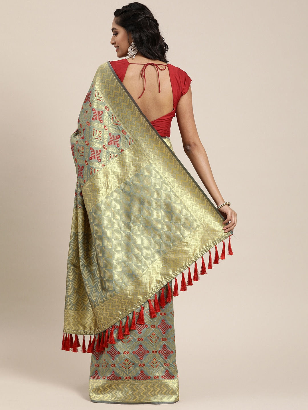 Stylish Patola Silk Saree with Woven Design & Zari Border