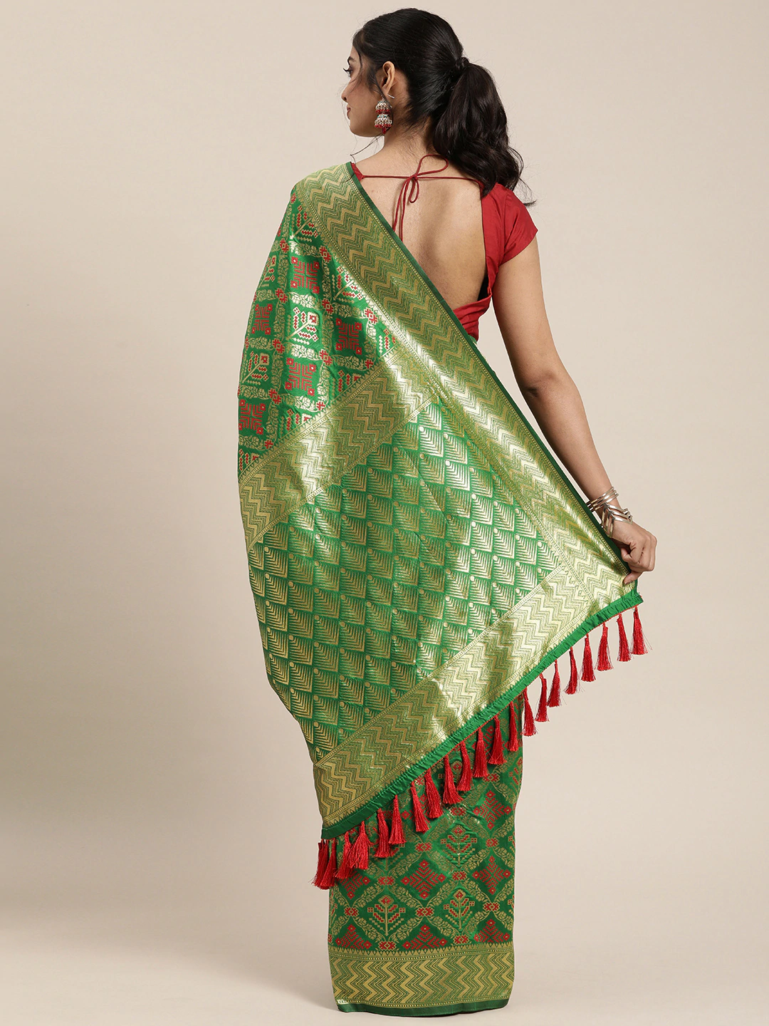 Exclusive Patola Silk Saree With Woven Design And Zari Work