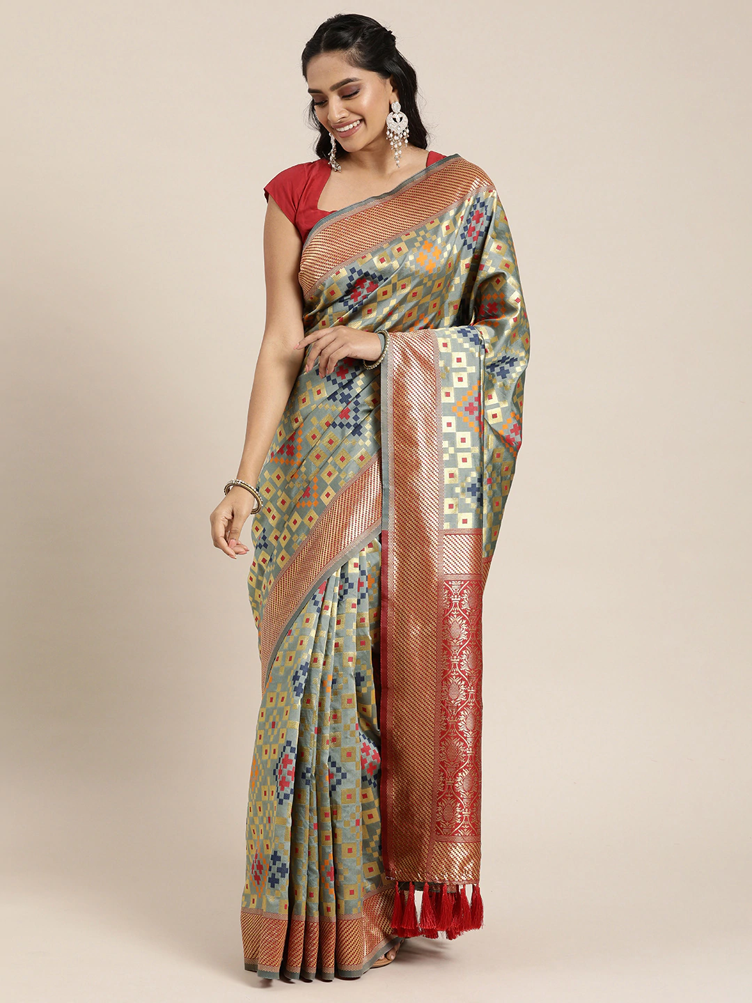 Stylish Patola Silk Saree With Woven Design & Zari Border