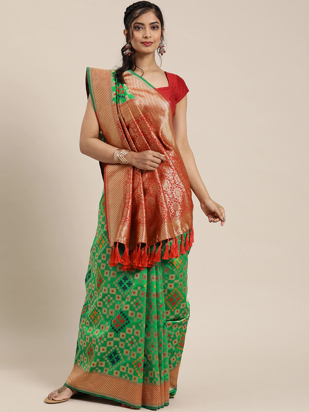 Stylish Green Colour Patola Silk Saree with Zari Border
