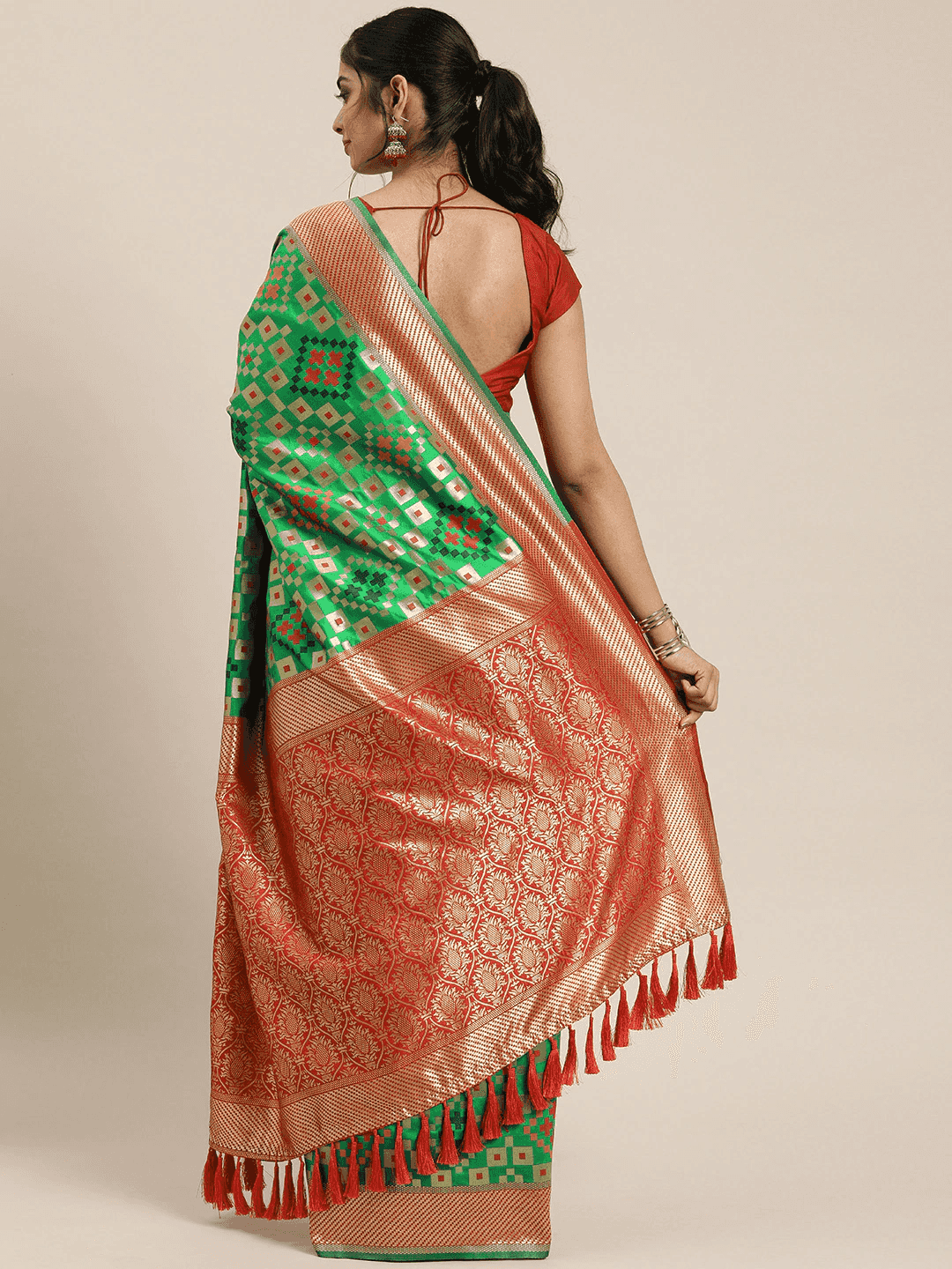 Stylish Green Colour Patola Silk Saree with Zari Border