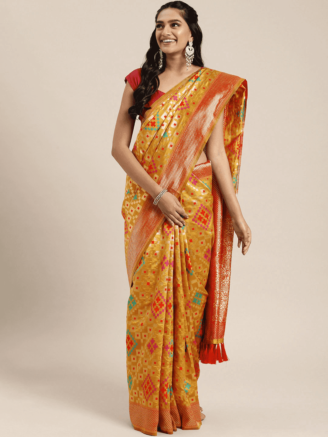 Latest Mustard Colour Patola Silk Saree with Zari Border