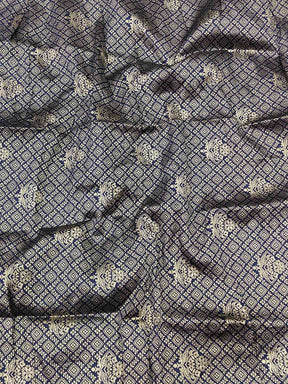 Close-up of intricate thread weaving on georgette fabric
