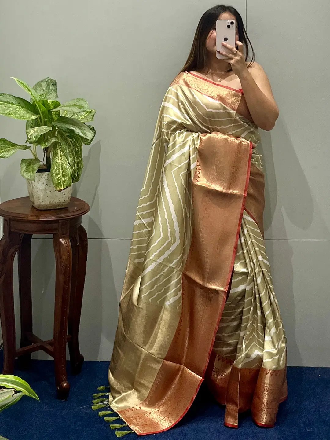 Elegant Kanchi Zari Border Leheriya Saree draped on model