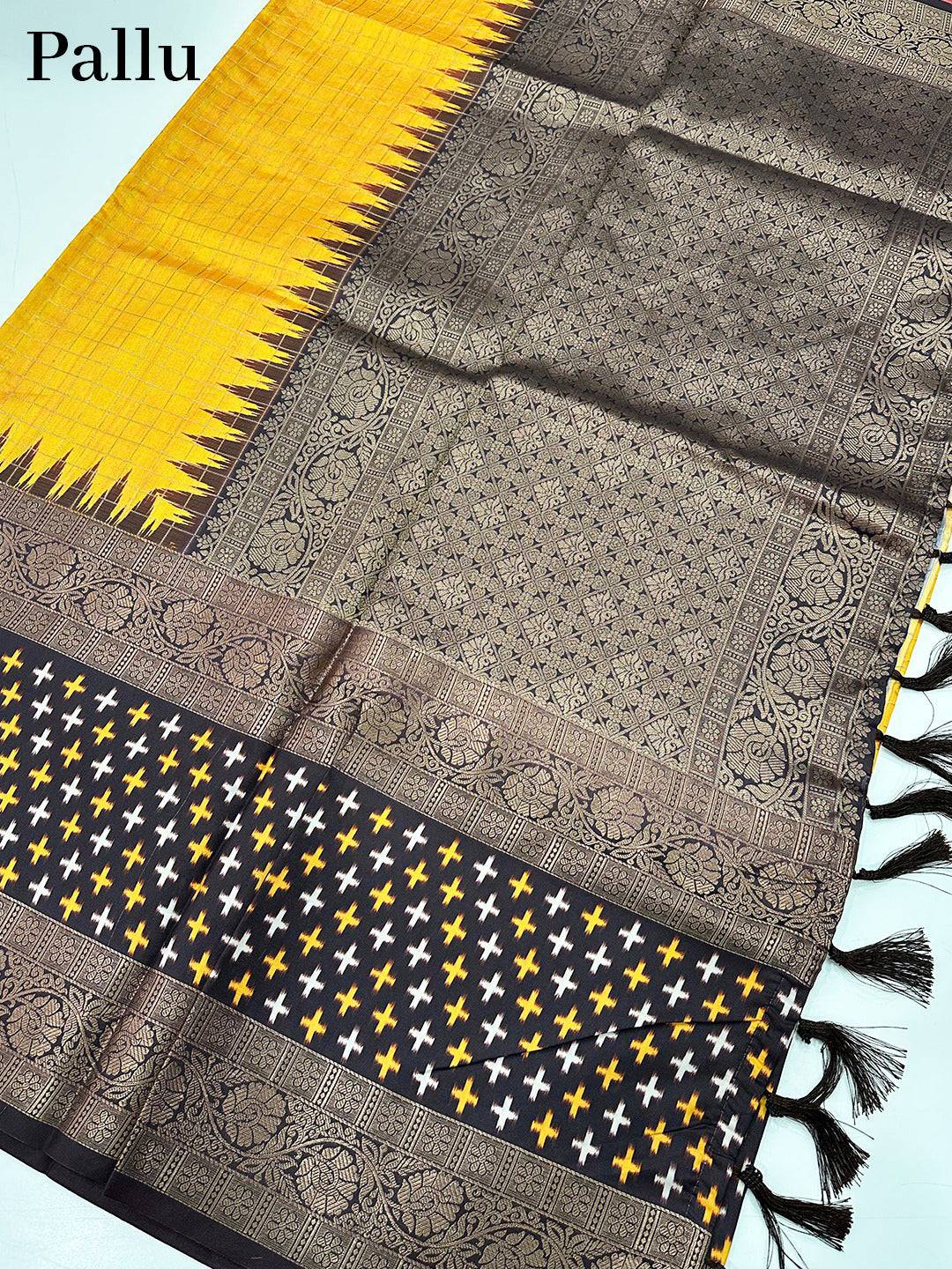 Pallu of Yellow Chex Ikkat saree with intricate design