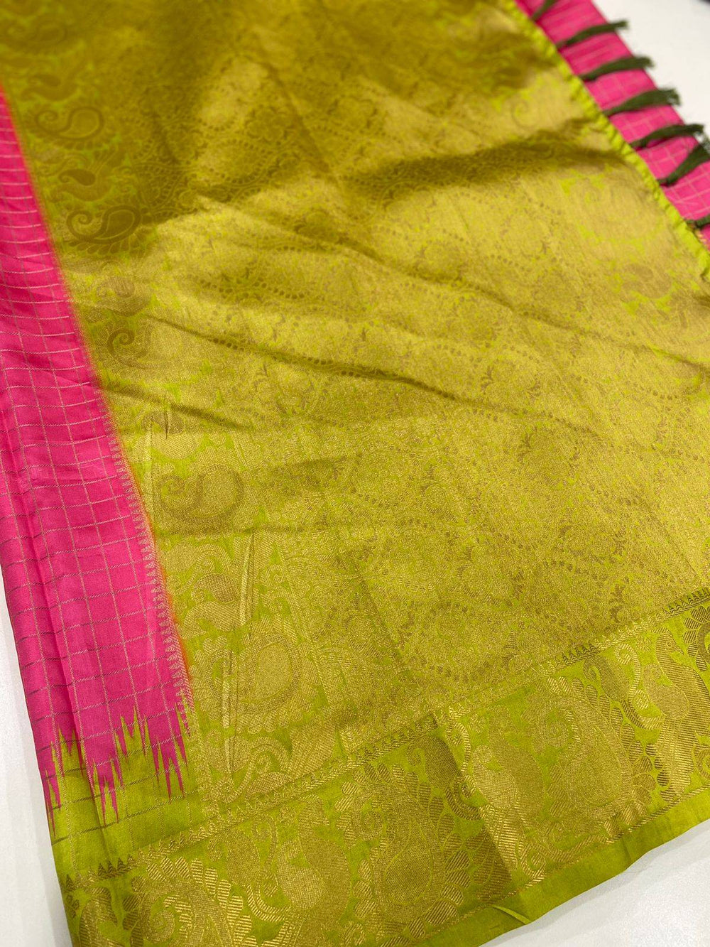 Intricate gold pattern on Gadwal Pattu Saree border