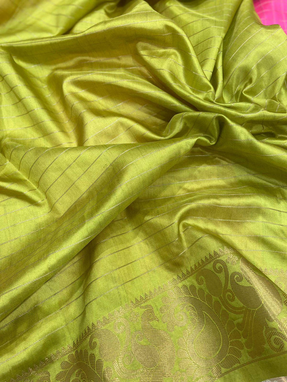 Vibrant green silk texture of Gadwal Pattu Saree
