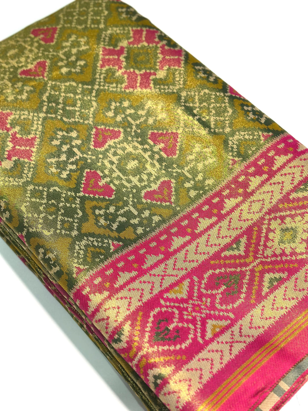 Close-up of Mendi Green Double Ikkat Semi Silk Patola