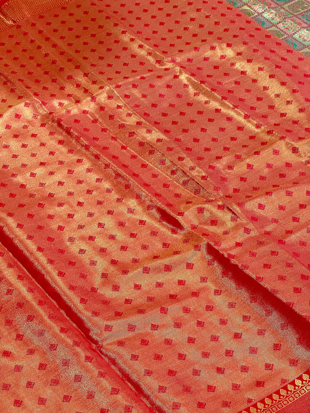 Pink Animal Motif Saree With Gold Zari Border