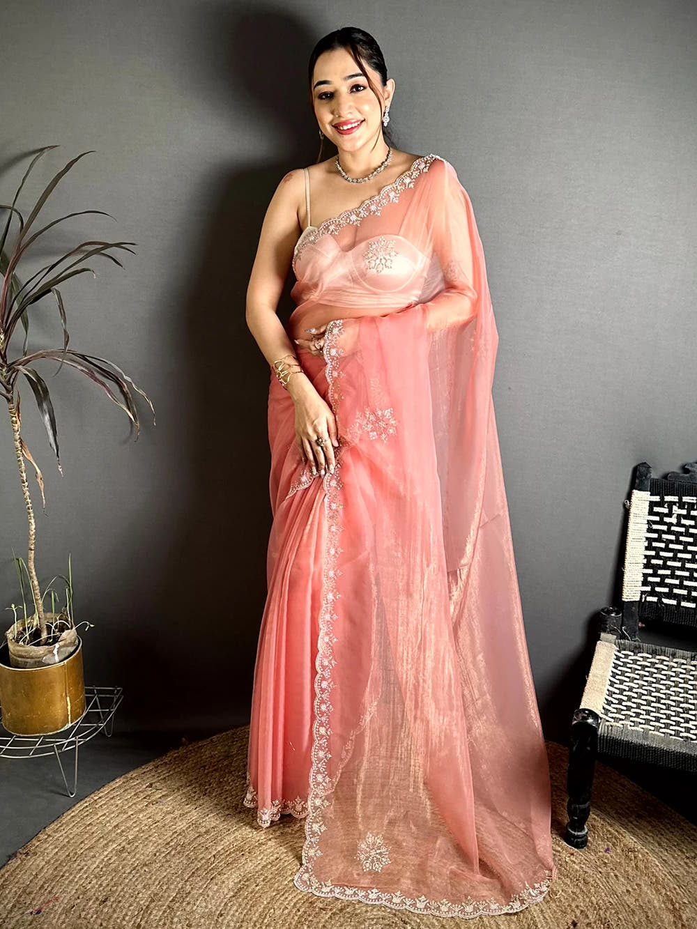Elegant Peach Tissue Pearl Diamond Work Saree
