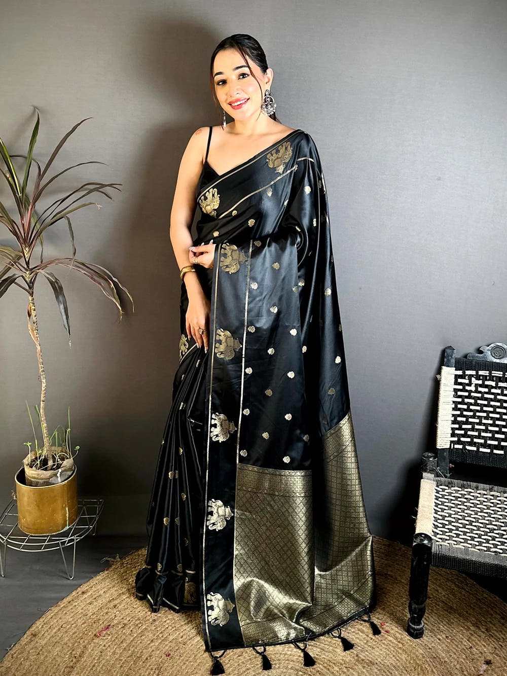 Black Mashru Satin Silk elephant zari butta saree, full front view of the drape with the checked woven pallu and tassels