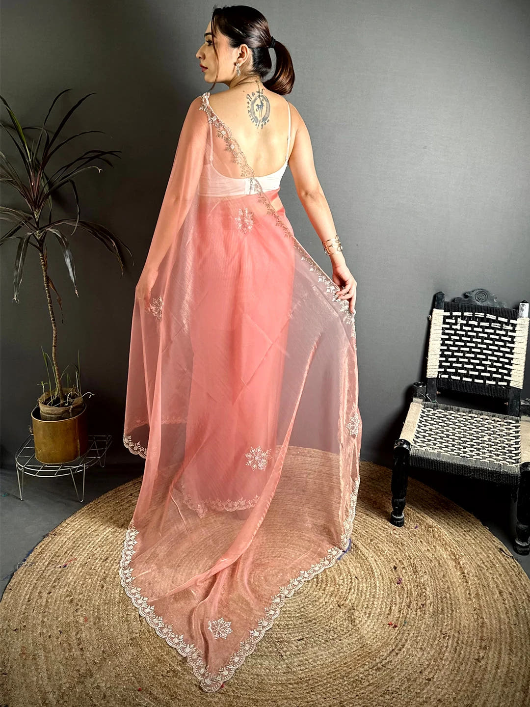 Elegant Peach Tissue Pearl Diamond Work Saree
