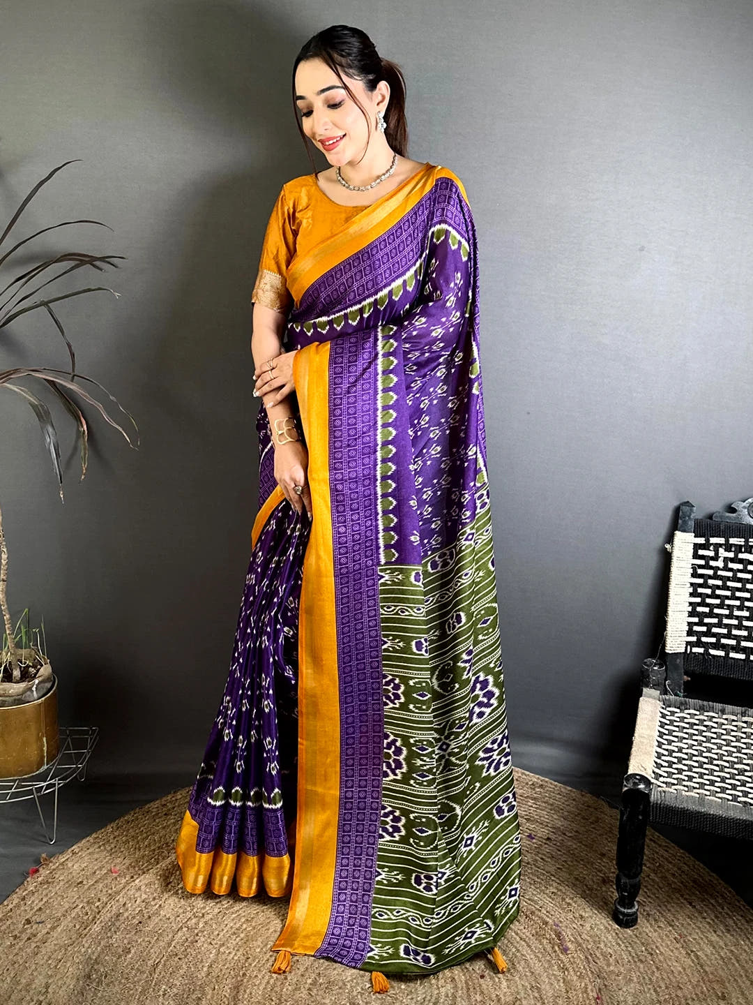 Purple Mul Cotton Ikkat Print Saree, full length drape on a model showing the olive green printed pallu with tassels