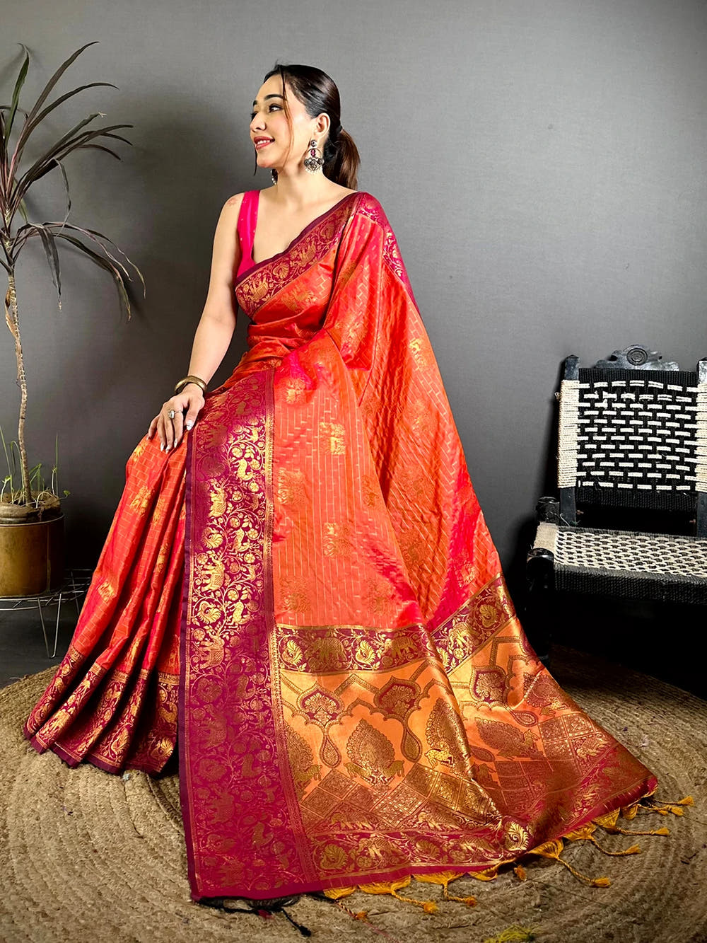 Exclusive Orange Soft Silk Jangal Zari Saree