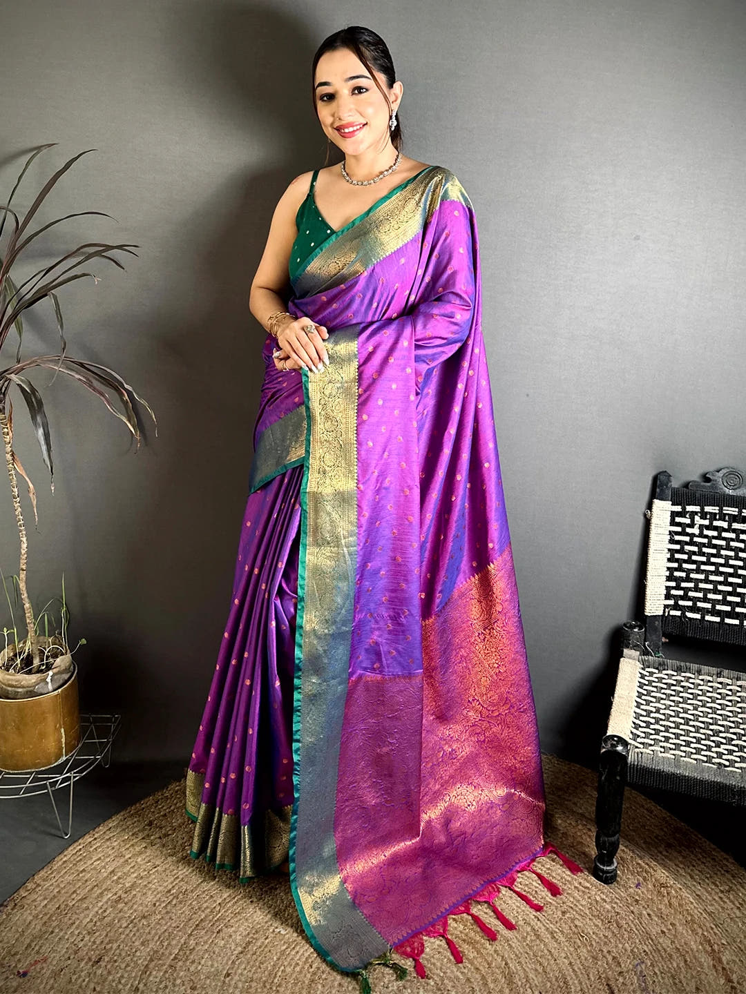 Royal purple raw silk woven buti saree, full front drape on model with the woven pallu and green blouse