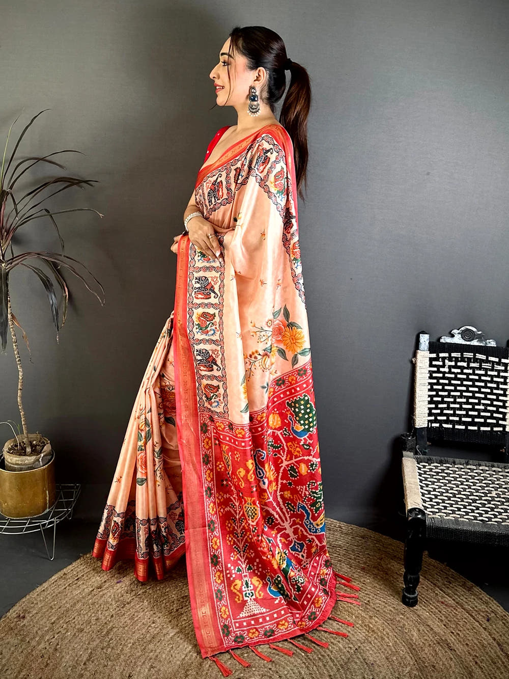 Exclusive Peach Soft Silk Ikkat Patola Print Saree