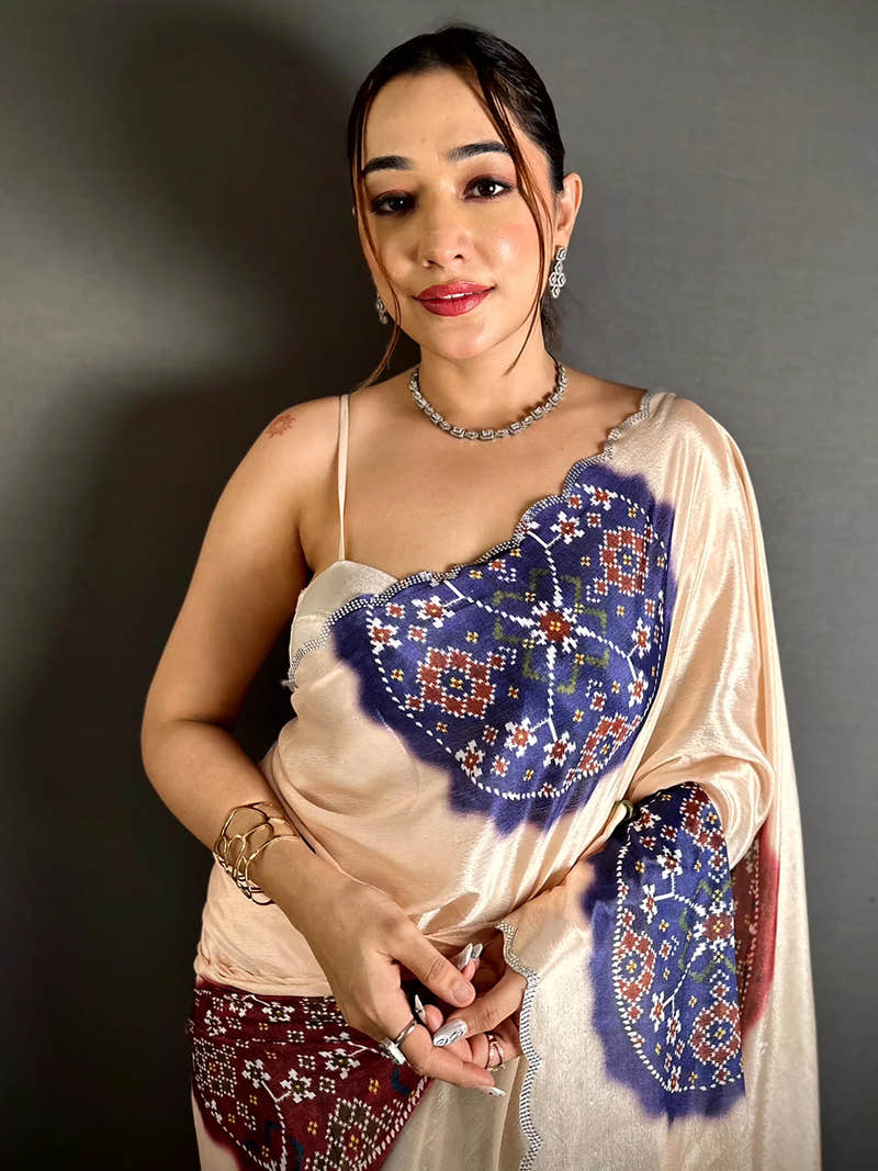 Elegant Cream Chiffon Bandhej Print Saree