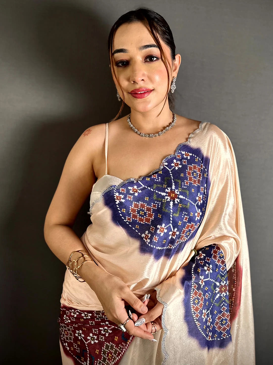 Elegant Cream Chiffon Bandhej Print Saree