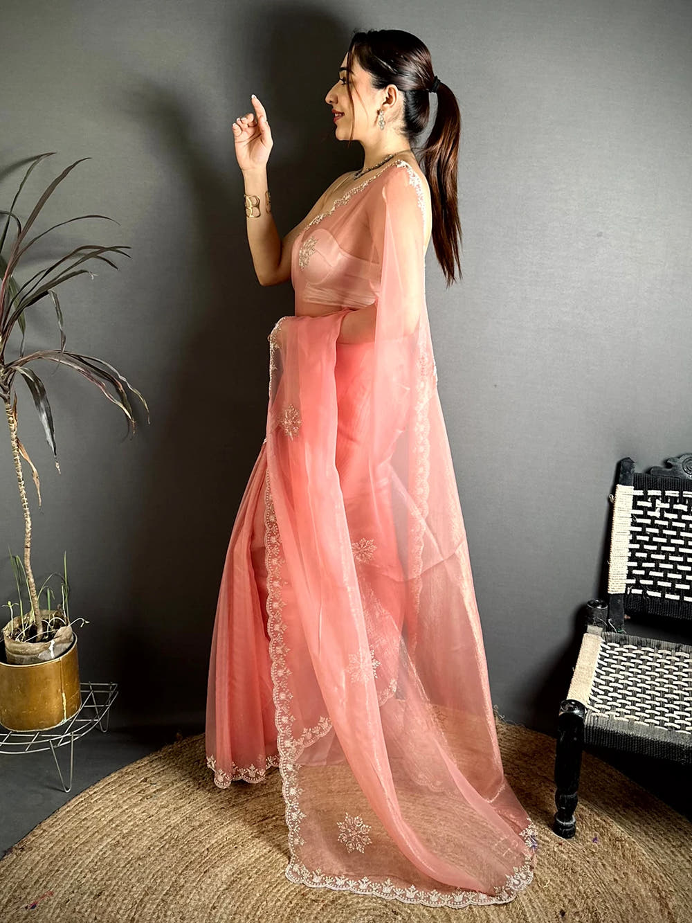 Elegant Peach Tissue Pearl Diamond Work Saree