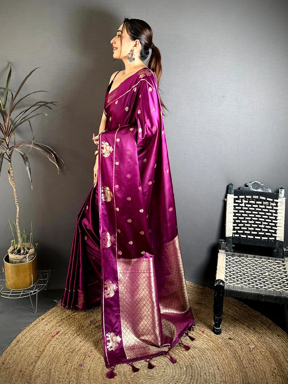 Wine Mashru Satin Silk Elephant Zari Butta Saree, side view showing the broad woven pallu with tassels at the end