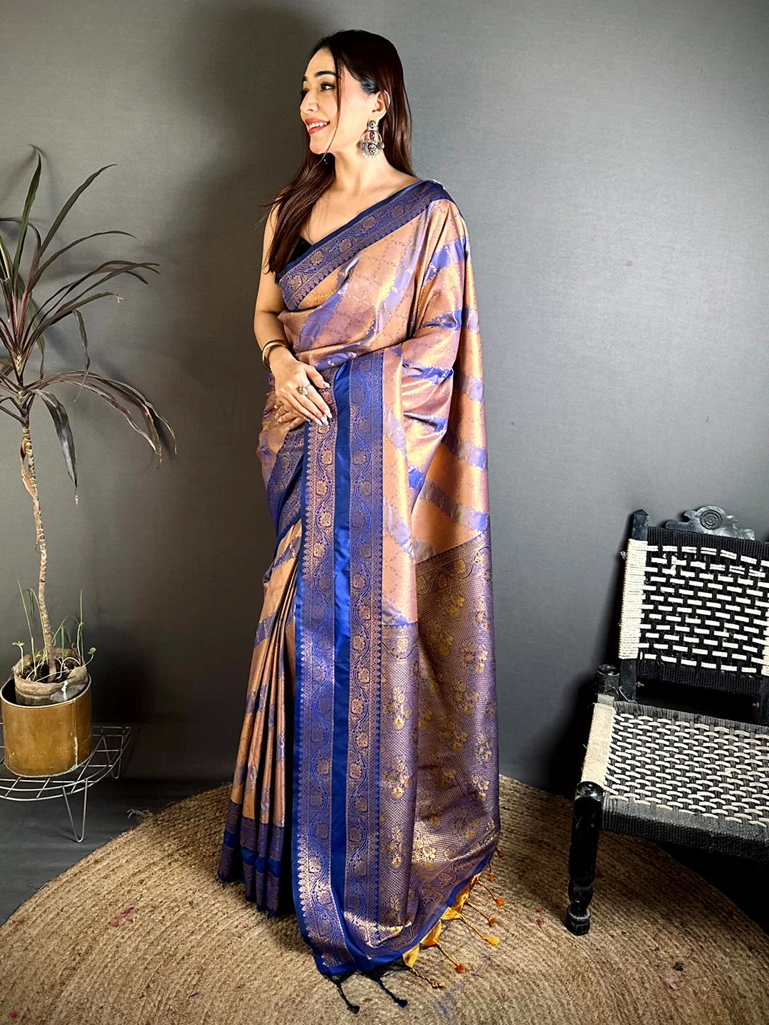 Royal Blue Kanchi Pattu lehriya zari weave saree, full length side view showing the diagonal zari stripes and blue border
