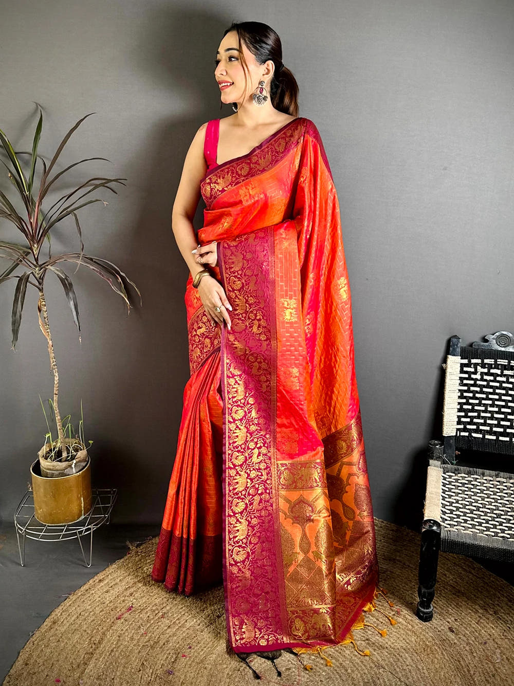 Exclusive Orange Soft Silk Jangal Zari Saree