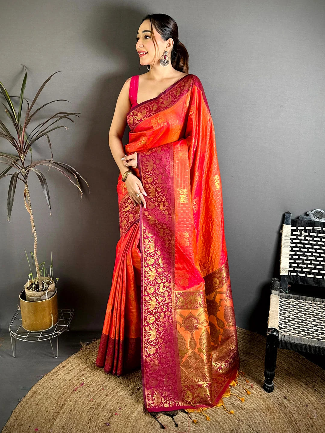 Exclusive Orange Soft Silk Jangal Zari Saree