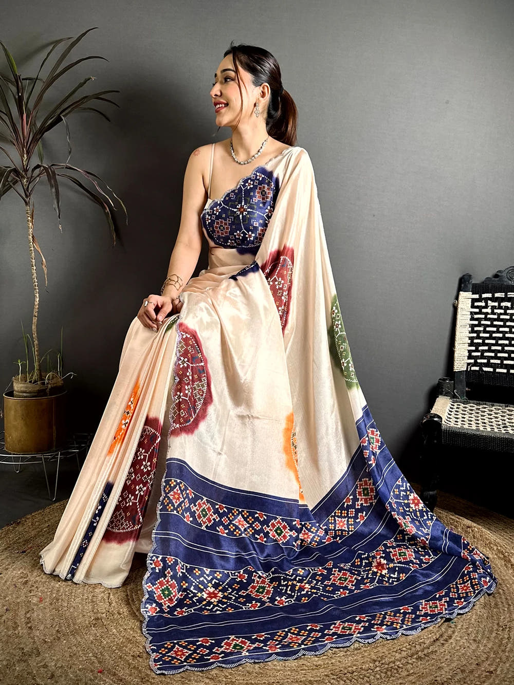 Elegant Cream Chiffon Bandhej Print Saree