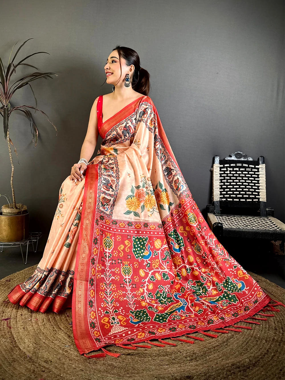 Exclusive Peach Soft Silk Ikkat Patola Print Saree