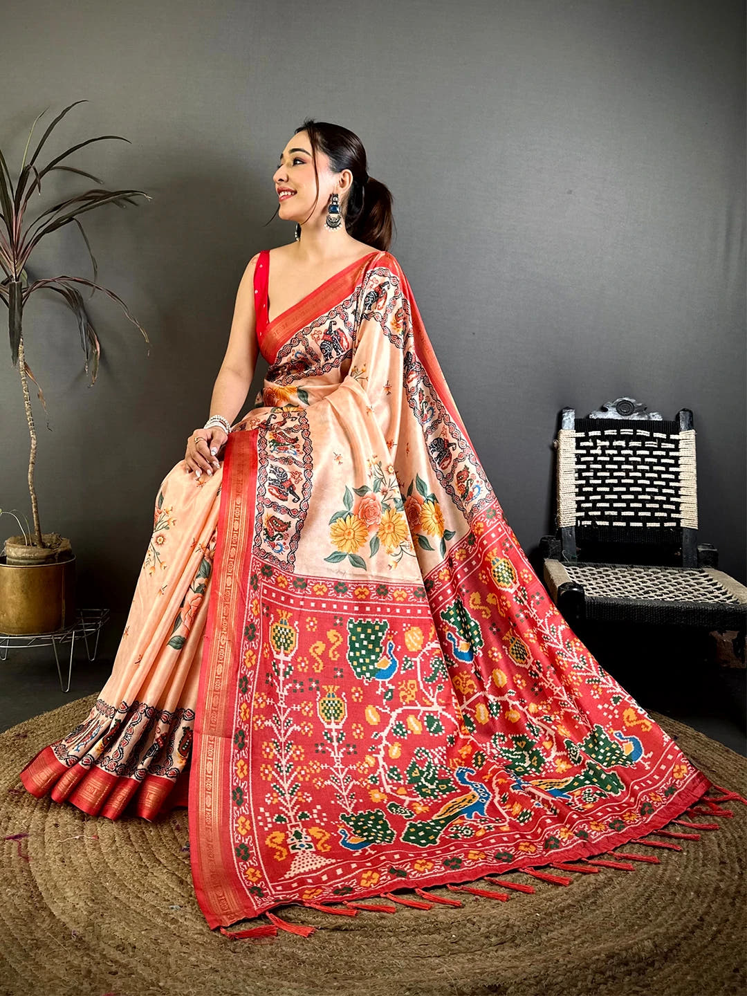 Exclusive Peach Soft Silk Ikkat Patola Print Saree