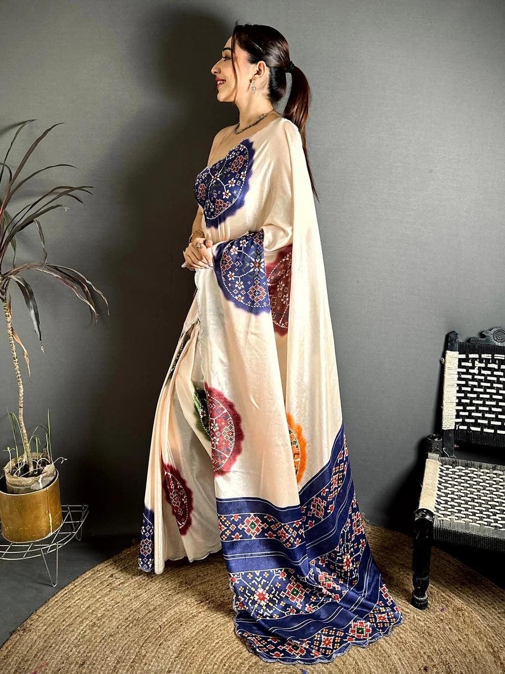 Elegant Cream Chiffon Bandhej Print Saree