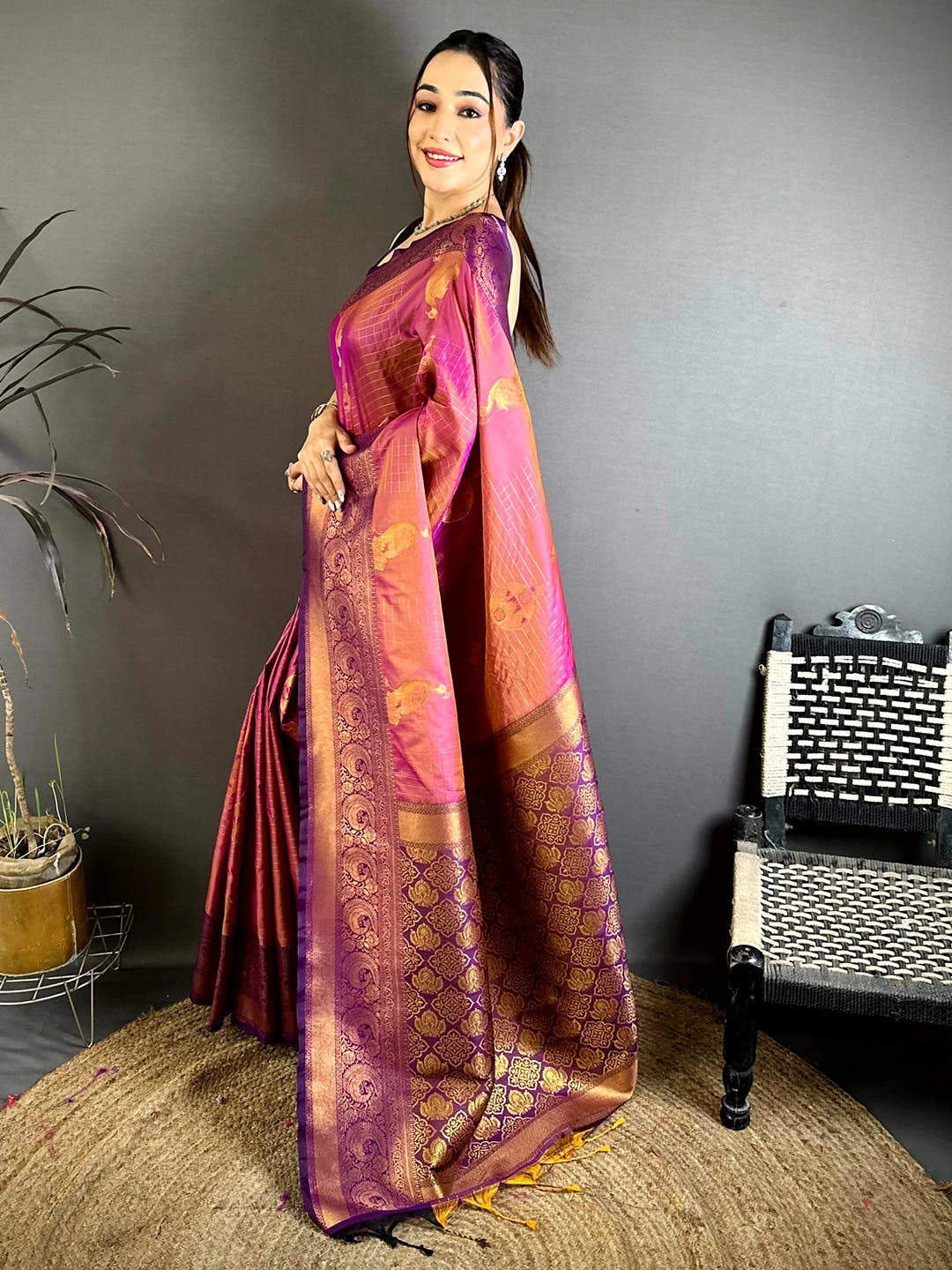 Magenta Soft Silk copper zari weave saree, side view of the drape showing the pallu with geometric woven pattern