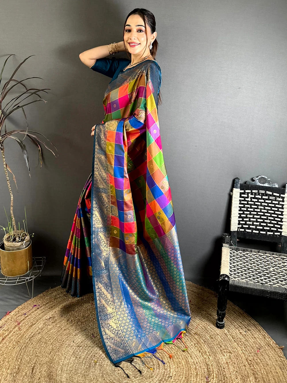 Multicolour silk minakari-style zari butti saree, side view showing the zari woven pallu and tassel ends