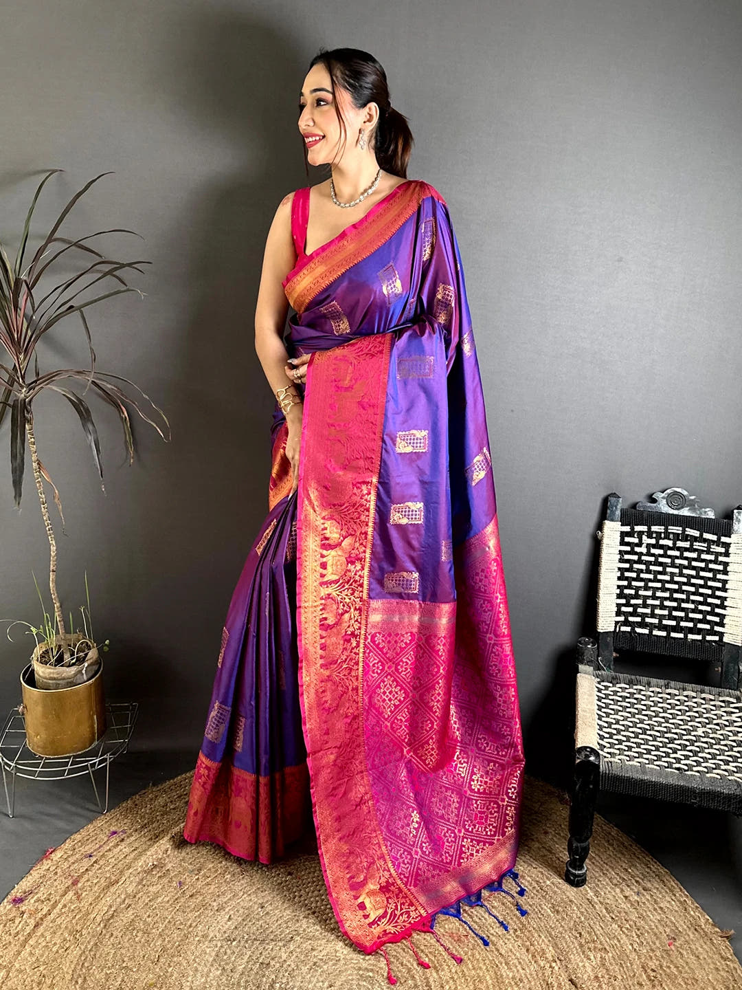 purple soft silk woven butta saree, full length side view showing the gold butta motifs across the body