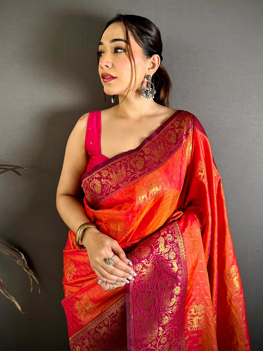 Exclusive Orange Soft Silk Jangal Zari Saree