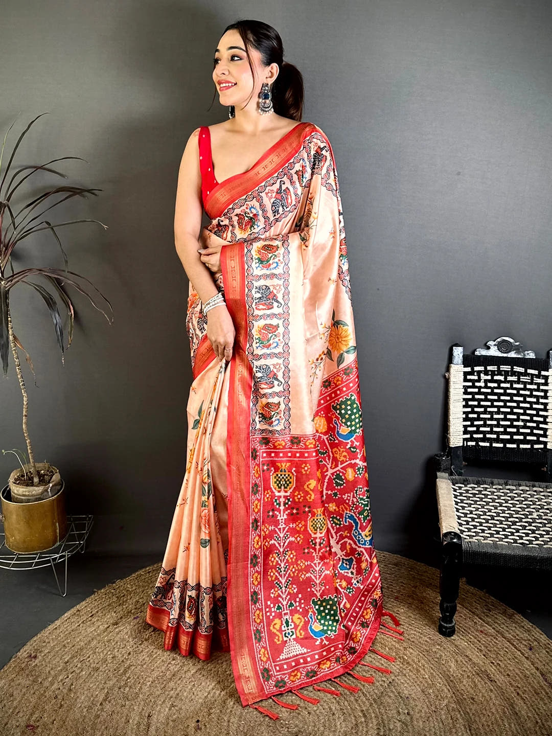Exclusive Peach Soft Silk Ikkat Patola Print Saree