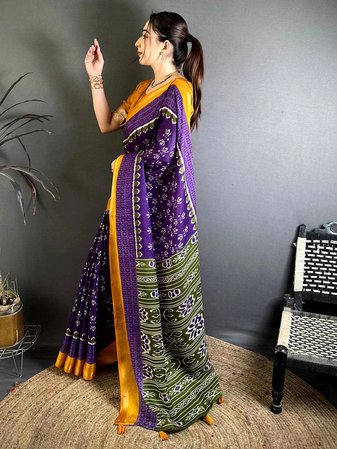 Purple Mul Cotton Ikkat Print Saree, side view of the drape with the mustard border and olive printed pallu