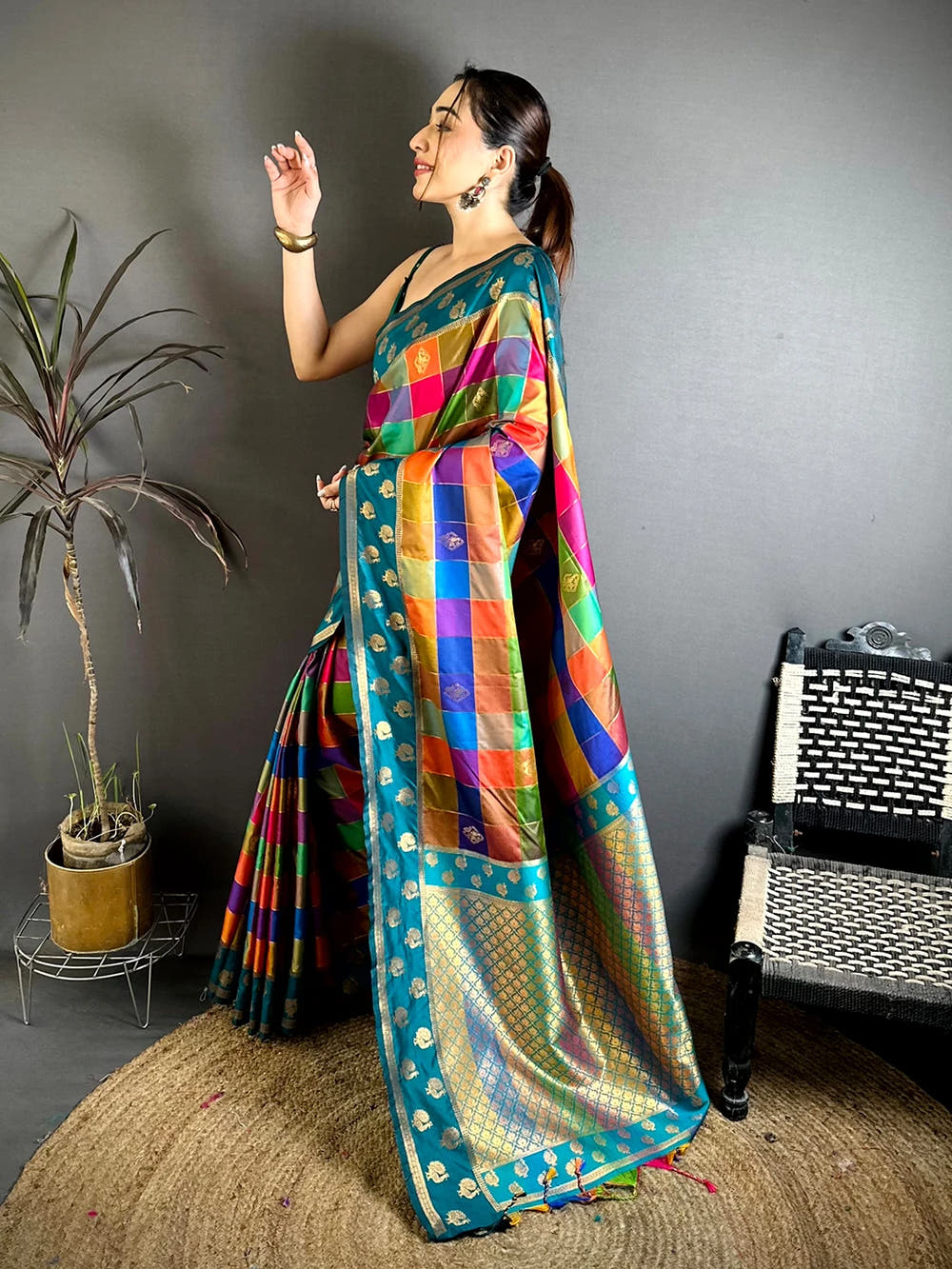 Teal multi colour soft silk Pallampazam-style chex saree, side view showing the contrast teal border and drape