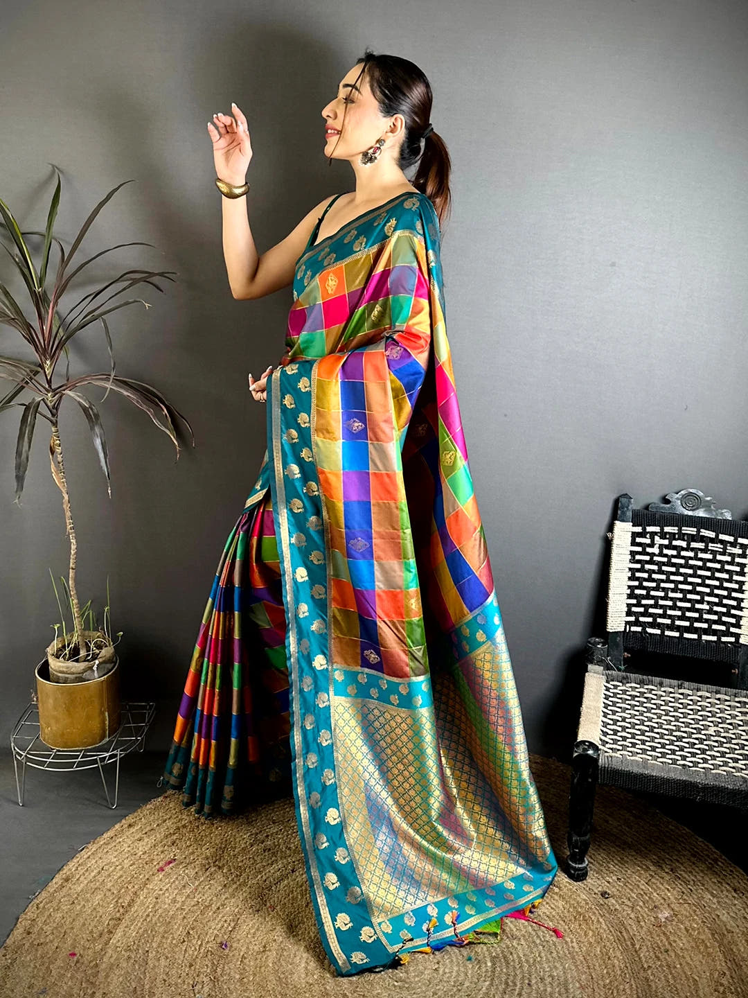 Teal multi colour soft silk Pallampazam-style chex saree, side view showing the contrast teal border and drape