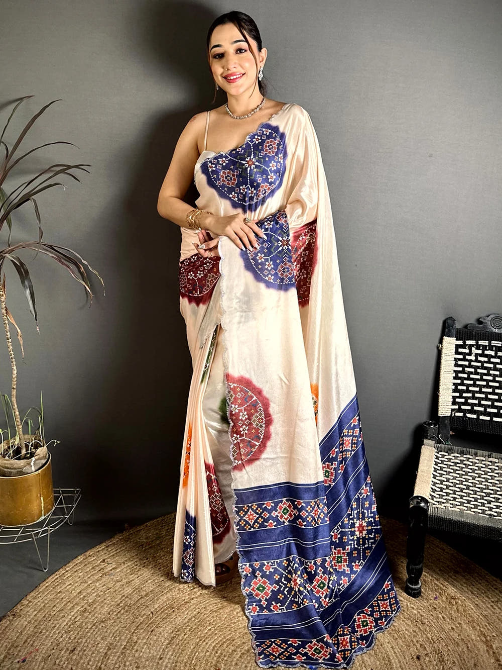 Elegant Cream Chiffon Bandhej Print Saree
