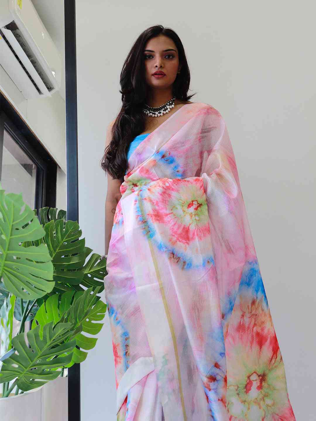 Multicolour tie dye satin Kota Doriya saree on model